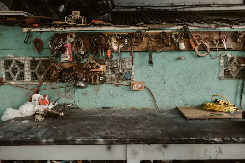 Tools organised on a wall rack in a training workshop