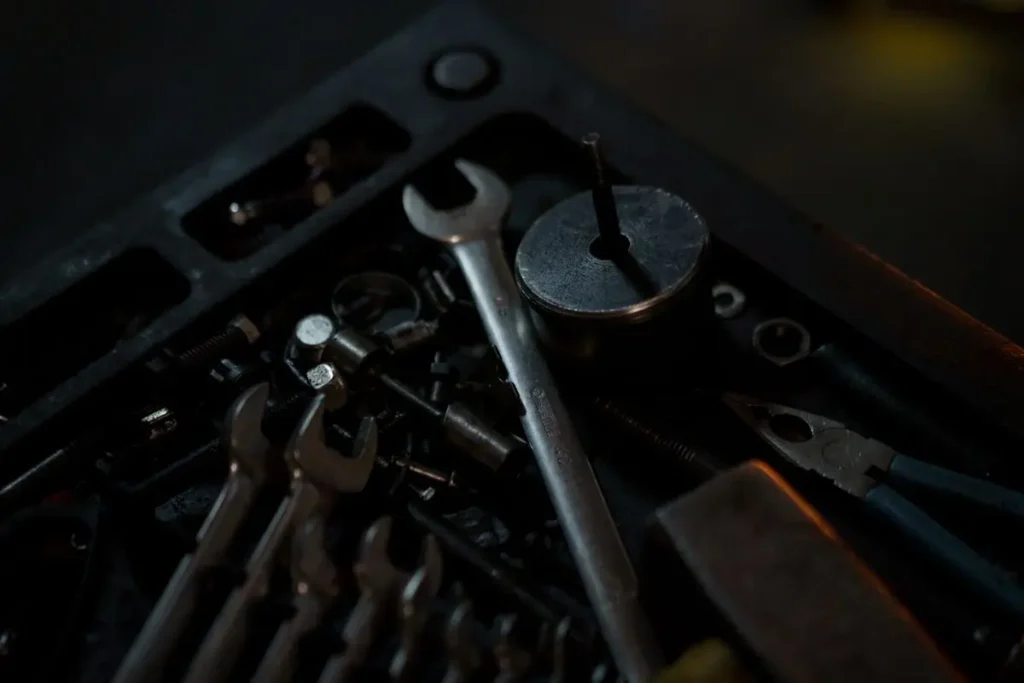 A close view of wrenches and hand tools in a workshop